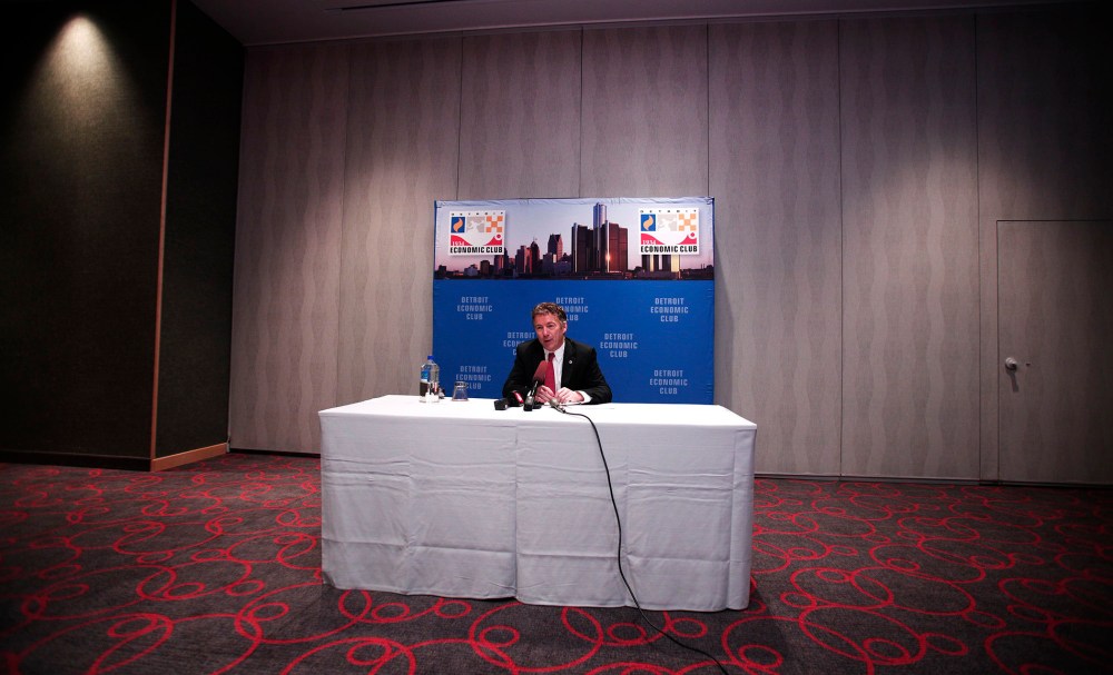 Sen. Rand Paul (R-KY) speaks with the news media after delivering a speech in Detroit, Michigan, December 6, 2013.
