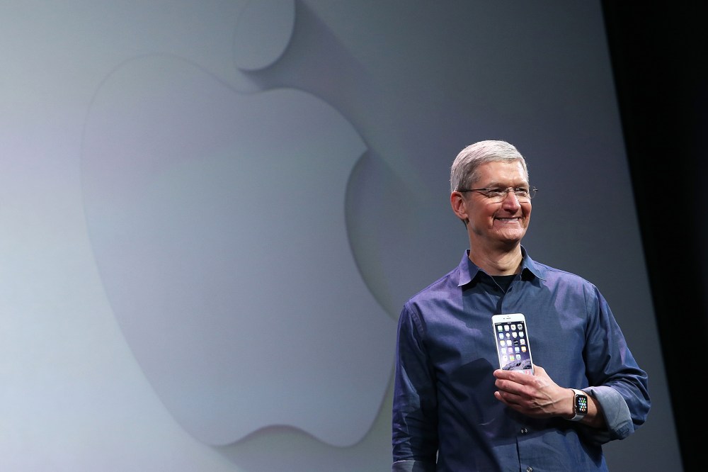 Apple CEO Tim Cook shows off the new iPhone 6 and the Apple Watch during an Apple special event at the Flint Center for the Performing Arts on Sept. 9, 2014 in Cupertino, Calif.