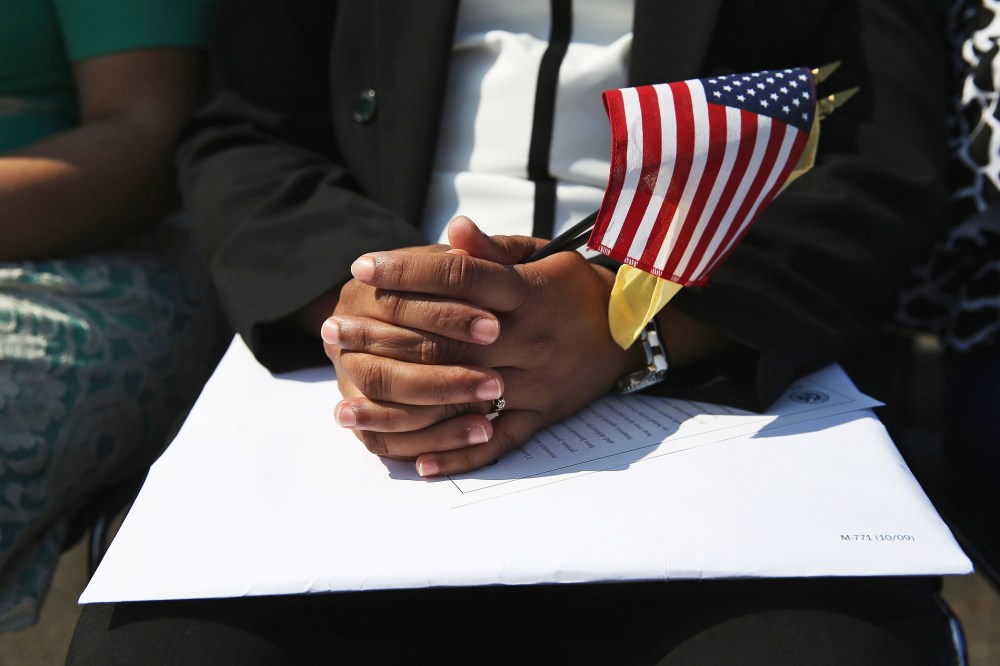 Immigrants prepare to become U.S. citizens at a naturalization ceremony at Liberty State Park on September 19, 2014 in Jersey City, New Jersey.