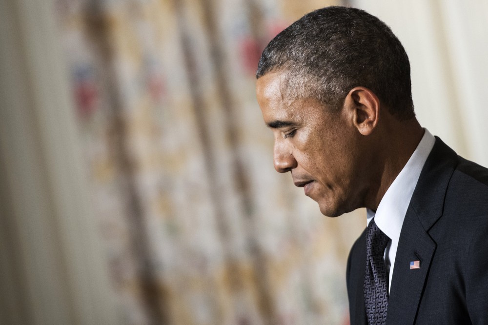 President Barack Obama pauses while speaking in the White House on Sept. 25, 2014 in Washington, D.C.