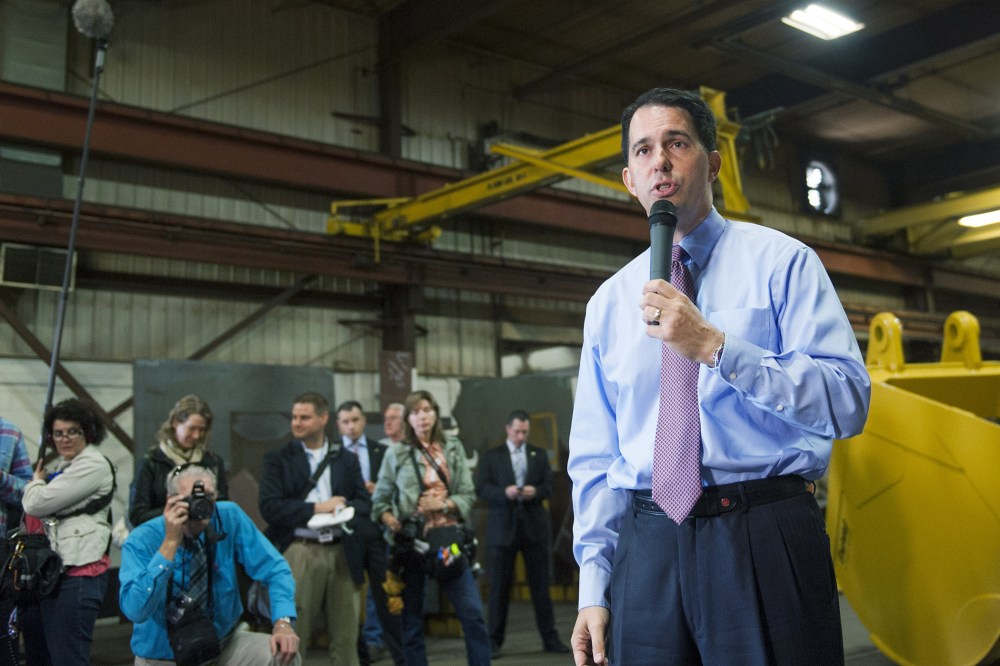 Wisconsin Gov. Scott Walker speaks at Empire Bucket, a manufacturing facility on Sept. 29, 2014 in Hudson, Wisconsin. (Photo by Stephen Maturen/Getty)