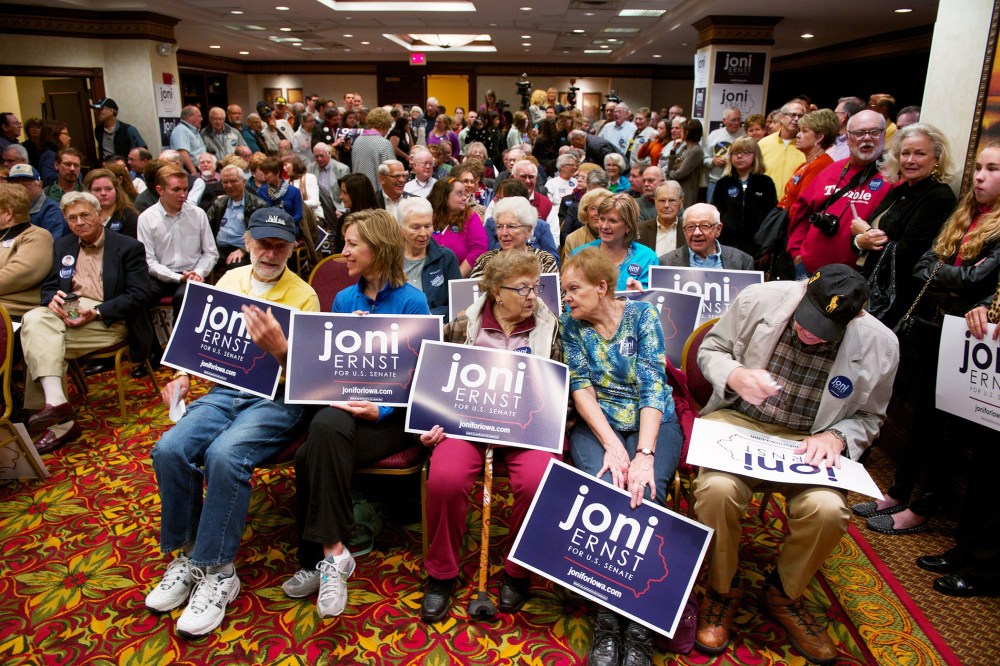 Supporters of Iowa Republican State Senator and U.S. Senate candidate Joni Ernst wait for a rally on Oct. 11, 2014 in Cedar Rapids, Iowa. (Photo by David Greedy/Getty)