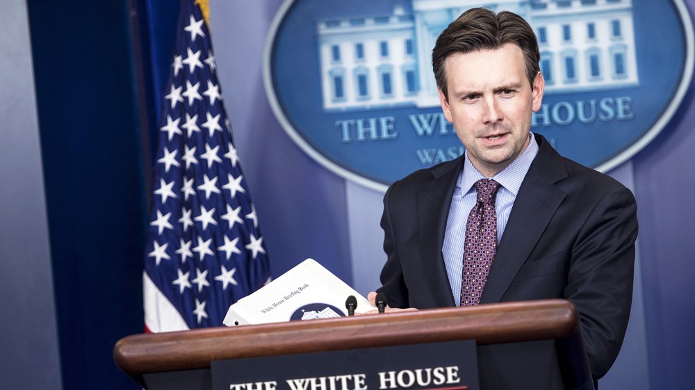 White House Press Secretary Josh Earnest arrives for a daily briefing at the White House on Oct. 15, 2014 in Washington, DC. (Photo by Brendan Smialowski/AFP/Getty)