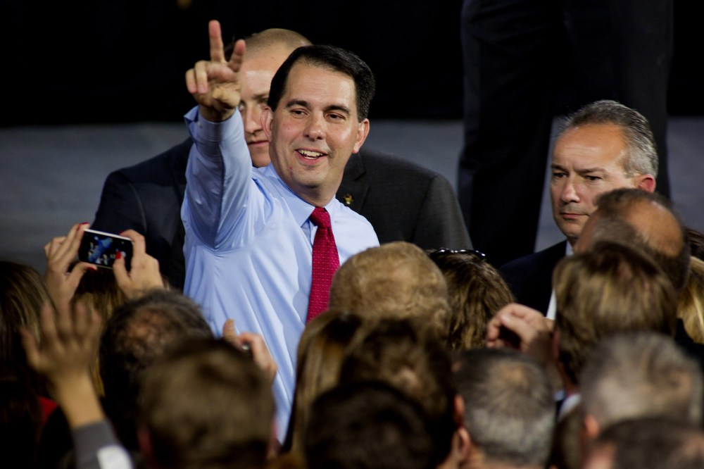 Wisconsin Gov. Scott Walker greets supporters at his election night party November 4, 2014 in West Allis, Wisc. (Darren Hauck/AP)