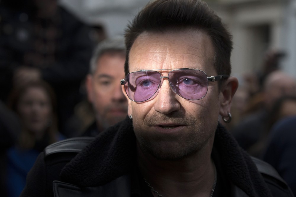 U2 frontman Bono arrives at a west London studio to record the new Band Aid 30 on Nov. 15, 2014. (ANDREW COWIE/AFP/Getty)