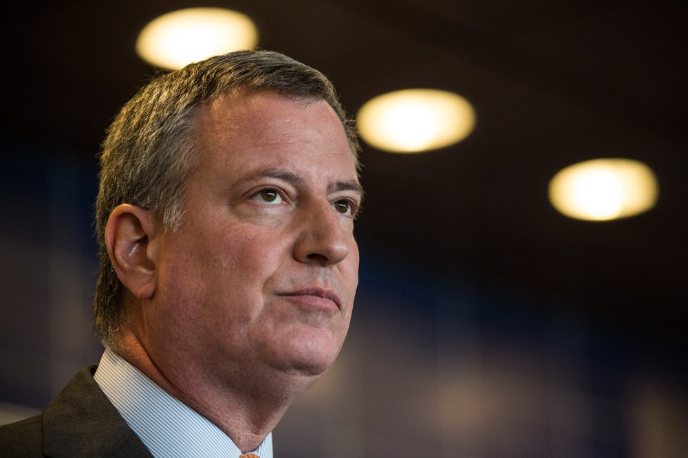 New York City Mayor Bill de Blasio speaks at a press conference after witnessing police being retrained with new guidelines at the Police Academy on Dec. 4, 2014 in the Queens borough of in New York City. (Andrew Burton/Getty)