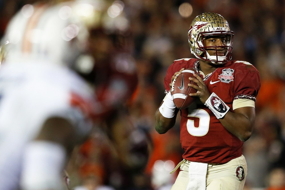 Quarterback Jameis Winston #5 of the Florida State Seminoles looks to pass during the 2014 Vizio BCS National Championship Game at the Rose Bowl on Jan. 6, 2014 in Pasadena, Calif. (Photo by Kevin C. Cox/Getty)