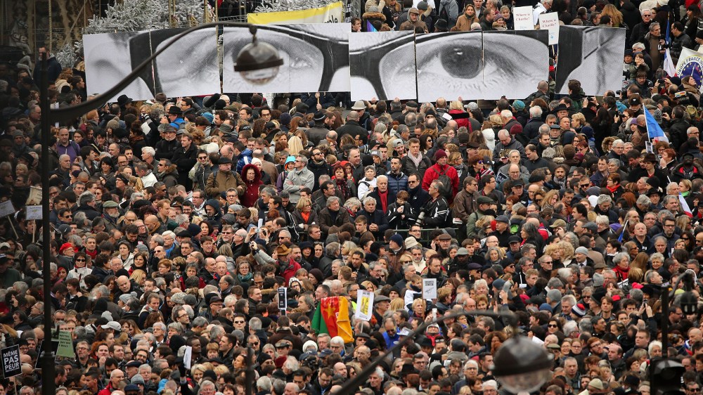 Demonstrators gather in Place de la Republique in Paris prior to a mass unity rally to be held in Paris following the recent terrorist attacks on Jan. 11, 2015. (Photo by Christopher Furlong/Getty)