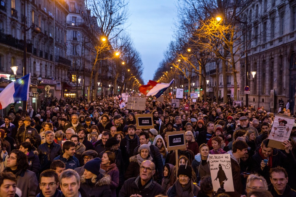 Demonstrators make their way along Place de la Republique during a mass unity rally following the recent terrorist attacks on Jan. 11, 2015 in Paris, France.