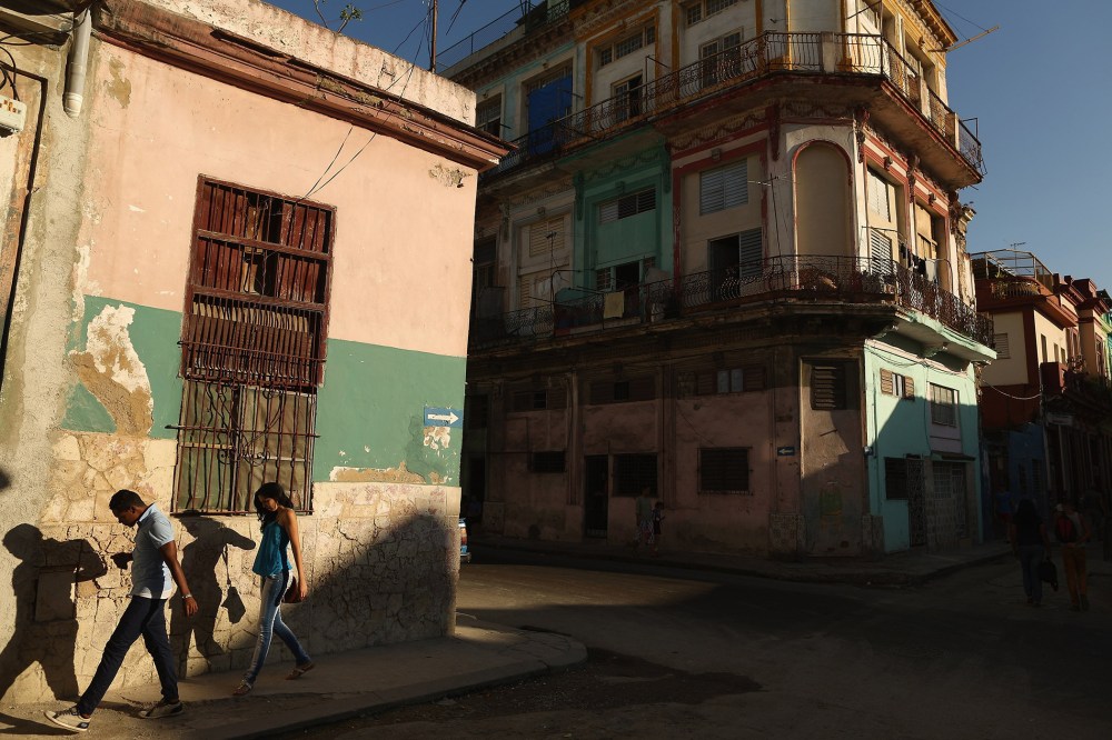 Young people walk through the Habana Central neighborhood on Jan. 21, 2015 in Havana, Cuba.