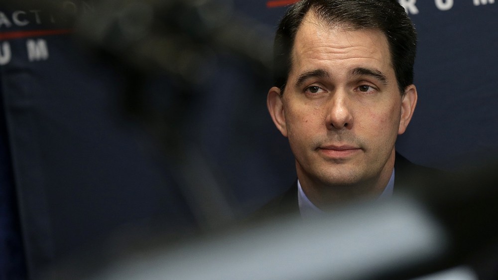 Wisconsin Governor Scott Walker waits to speak on Jan. 30, 2015 in Washington, DC. (Photo by Win McNamee/Getty)