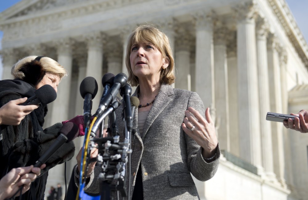 Massachusetts Attorney General Martha Coakley speaks to the media outside the US Supreme Court following oral arguments in the case of McCullen v. Coakley, dealing with a Massachusetts law imposing a 35-foot buffer zone around abortion clinics for demonst