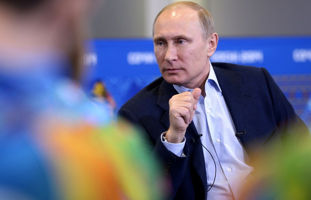 Russian President Vladimir Putin meets upcoming Olympic games' volunteers, Jan. 17, 2014 in Sochi, Russia.