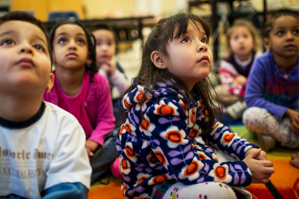 Students quietly listen in art class at Campbell Elementary School, in Arlington, VA, Jan. 14, 2014.