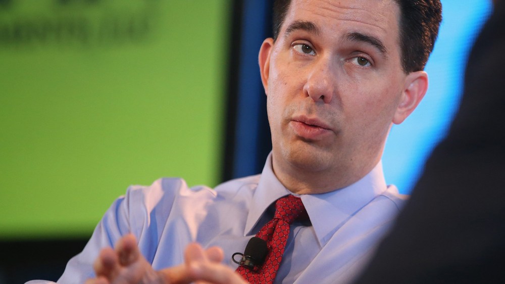 Wisconsin Governor Scott Walker fields questions from Bruce Rastetter at the Iowa Ag Summit on March 7, 2015 in Des Moines, Iowa. (Photo by Scott Olson/Getty)