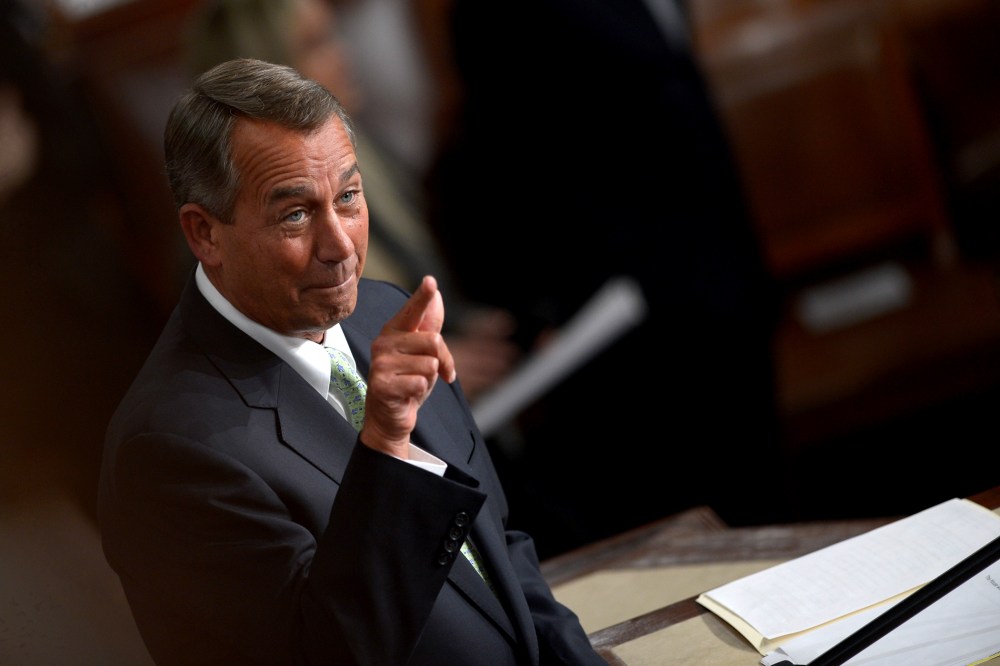 U.S. House Speaker John Boehner gestures before President Barack Obama delivers the State of the Union address on Jan. 28, 2014 at the US Capitol in Washington.