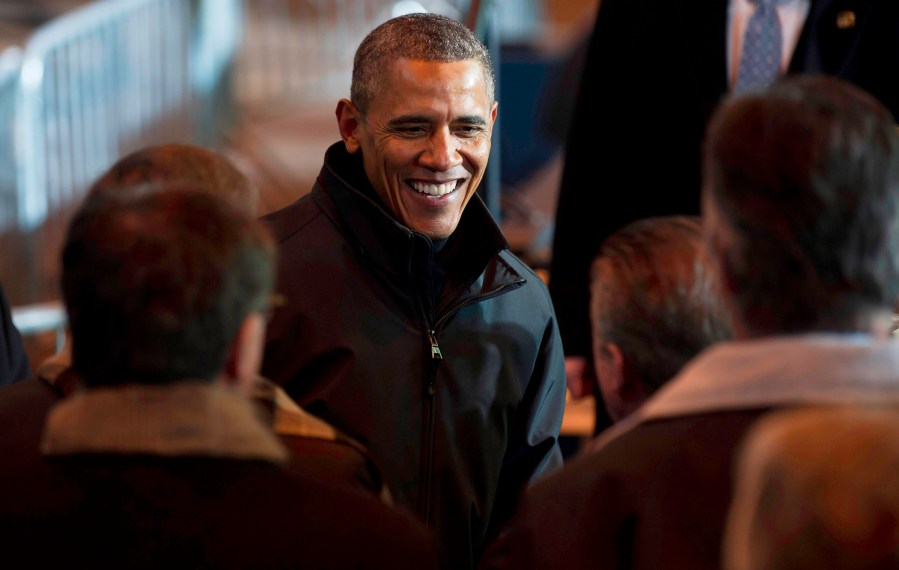 U.S. President Barack Obama greets people at the USX Irvin Works Jan. 29, 2014 in West Mifflin, Penn.