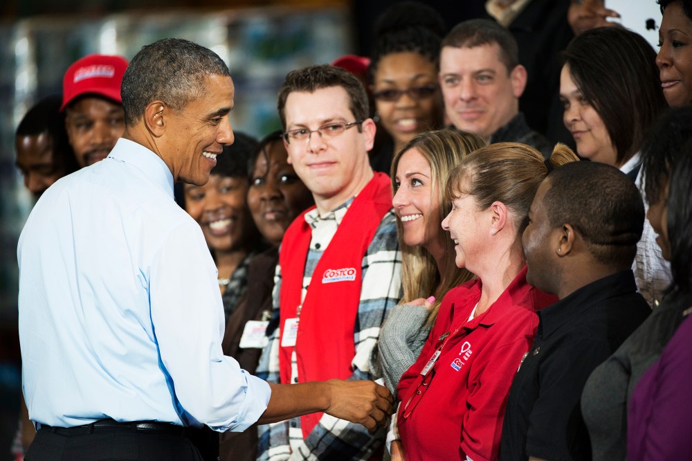 President Barack Obama greets Costco employees after his speech on the economy at a Costco Store Lanham, MD on Jan. 29, 2014.