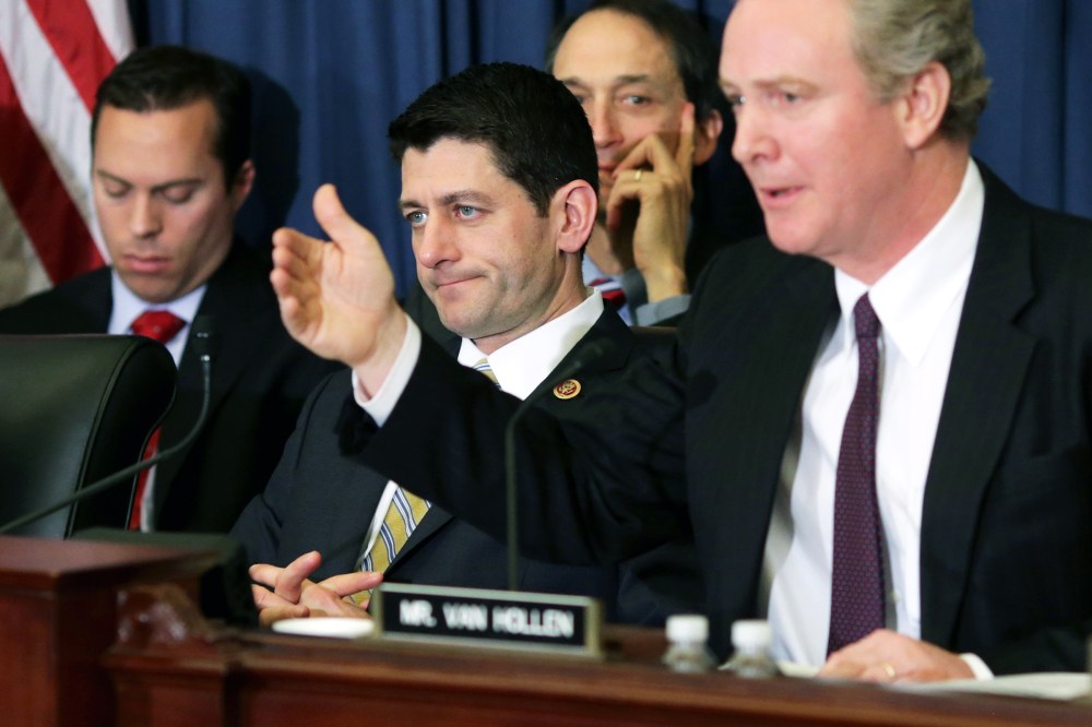 Paul Ryan listens to Rep. Chris Van Hollen speak before the House Budget Committee on Capitol Hill, Feb. 5, 2014.