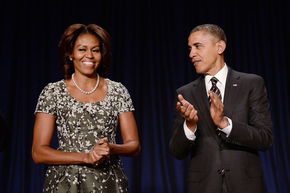 U.S. President Barack Obama and first lady Michelle Obama attend the National Prayer Breakfast in Washington, Feb. 6, 2014.