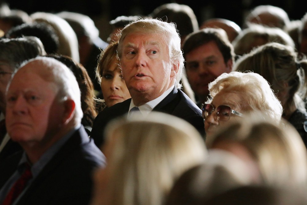 Real estate mogul and billionaire Donald Trump (C) attends Golf legend Jack Nicklaus' Congressional Gold Medal ceremony in the U.S. Capitol Rotunda on March 24, 2015 in Washington, DC.