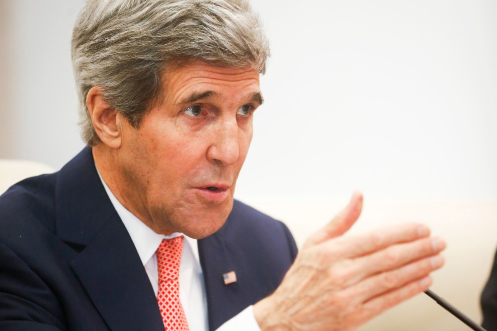 U.S. Secretary of State John Kerry gestures as he speaks in Beijing, Feb. 14, 2014.