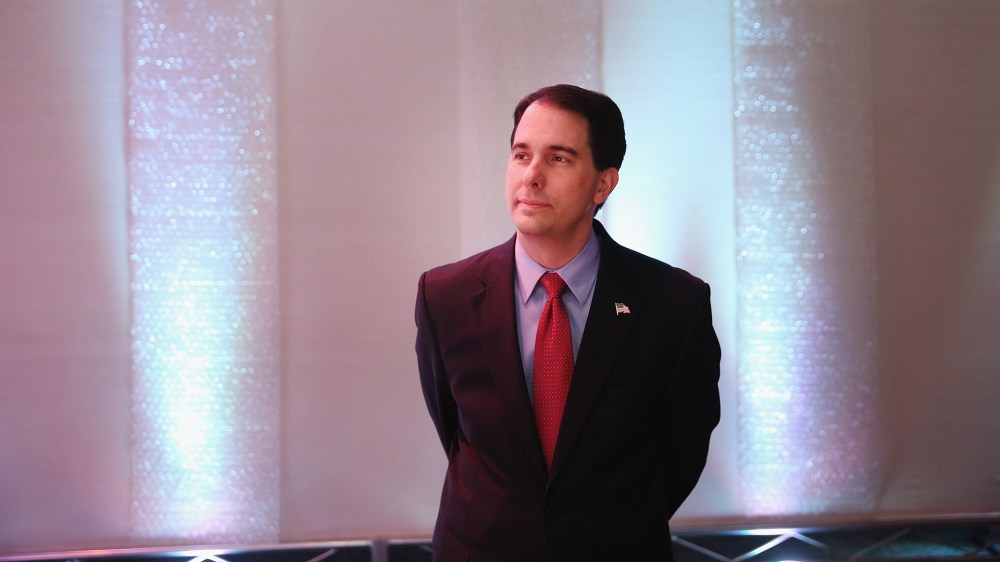 Governor Scott Walker of Wisconsin prepares to speak at the Iowa Faith and Freedom Coalition 2015 Spring Kickoff on April 25, 2015 in Waukee, Iowa. (Photo by Scott Olson/Getty)