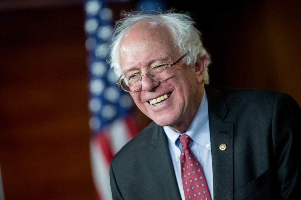 Senator Bernie Sanders, an Independent from Vermont, smiles while responding to a question during a news conference on Capitol Hill in Washington, DC, April 29, 2015. (Photo by Andrew Harrer/Bloomberg/Getty)