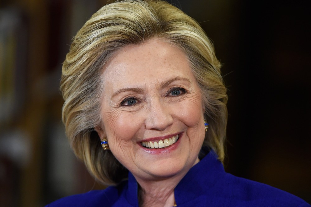 Democratic presidential candidate and former U.S. Secretary of State Hillary Clinton smiles as she speaks at Rancho High School on May 5, 2015 in Las Vegas, Nev. (Photo by Ethan Miller/Getty)