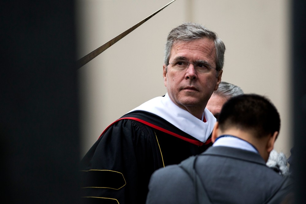 Republican U.S. presidential hopeful Jeb Bush waits to take the stage prior to delivering the commencement address at Liberty University, at Williams Stadium, May 9, 2015 in Lynchburg, Va. (Photo by Drew Angerer/Getty)