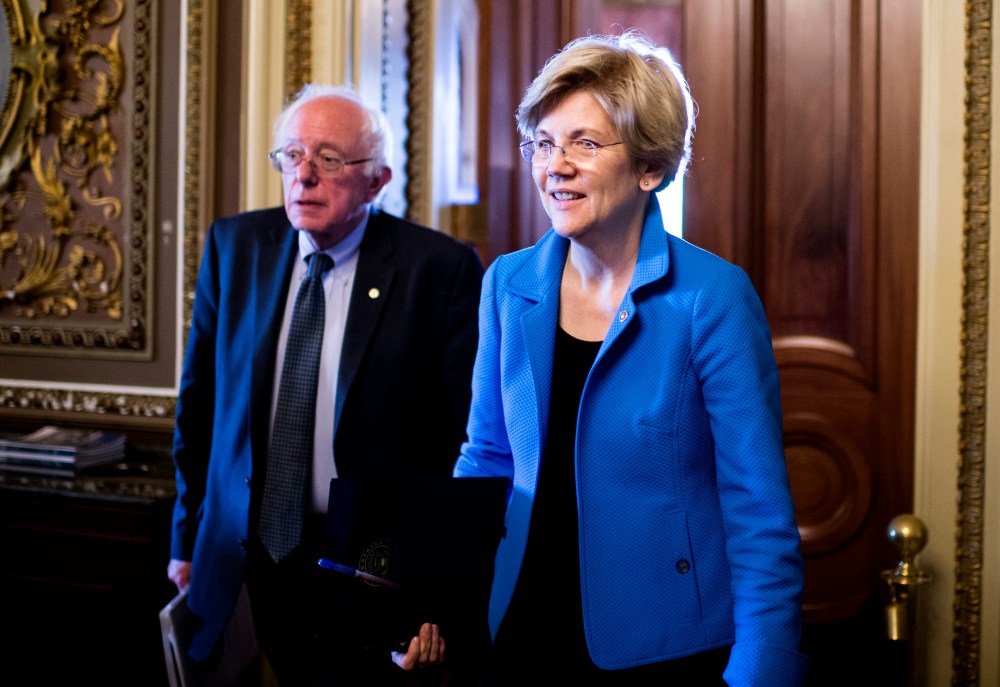 Sen. Bernie Sanders, I-Vt., and Sen. Elizabeth Warren, D-Mass., leave the Senate Democrats' policy luncheon on, May 12, 2015. (Photo By Bill Clark/CQ Roll Call/Getty)