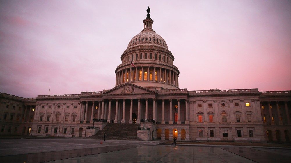 The morning sun begins to rise in front of the U.S. Capitol on March 11, 2014 in Washington, DC. (Mark Wilson/Getty)