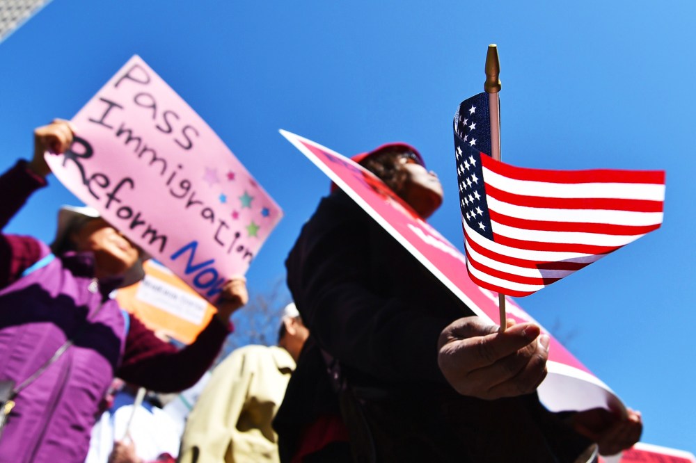 A coalition of New York area groups rally to call on Congress to move on immigration reform in New York, April 10, 2014.