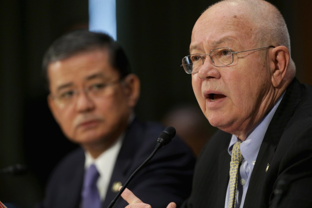 U.S. Veterans Affairs Secretary Eric Shinseki (L) and Veterans Affairs Undersecretary for Health Robert Petzel testify before the Senate Veterans' Affairs Committee, May 15, 2014 in Washington, DC.