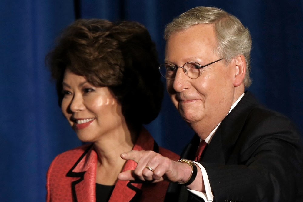 Senate Republican leader Sen. Mitch McConnell (R-KY) and his wife Elaine Chao arrive for a victory celebration following the early results of the state Republican primary May 20, 2014 in Louisville, Ky.