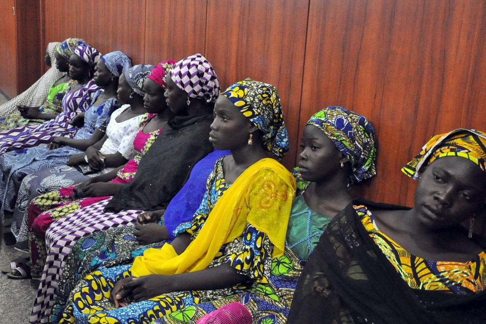 Schoolgirls who have escaped from Boko Haram kidnappers in the village of Chibok, sit at the Government house to speak with State Governor Kashim Shettima in Maiduguri on June 2, 2014.