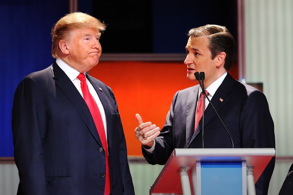 Republican presidential candidates Donald Trump and Sen. Ted Cruz (R-TX) speak during a commercial break in the sixth Republican presidential debate in North Charleston, S.C., on Jan. 14, 2016. (Photo by Scott Olson/Getty)