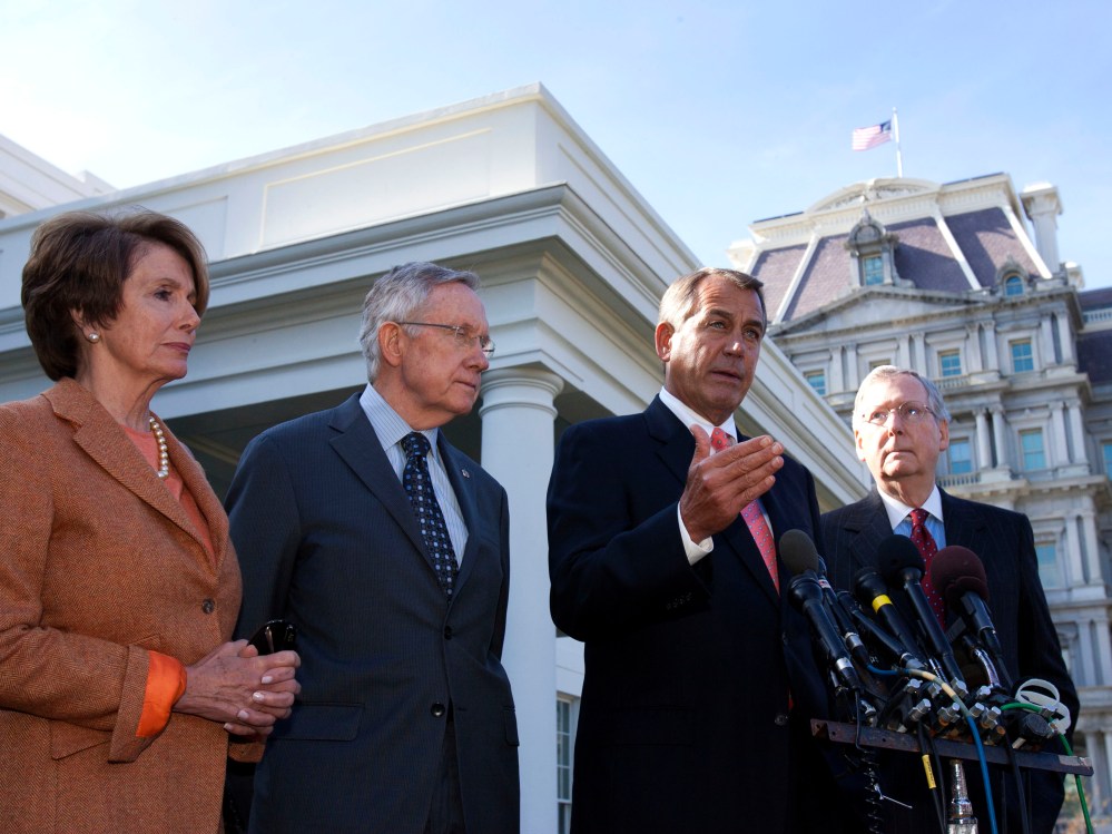 Speaker John Boehner (R-OH) speaks to the media, accompanied by (from left) House Minority Leader Nancy Pelosi (D-CA), Senate Majority Leader Harry Reid (D-NV), and Senate Minority Leader Mitch McConnell (R-KY), at the White House after meeting with...