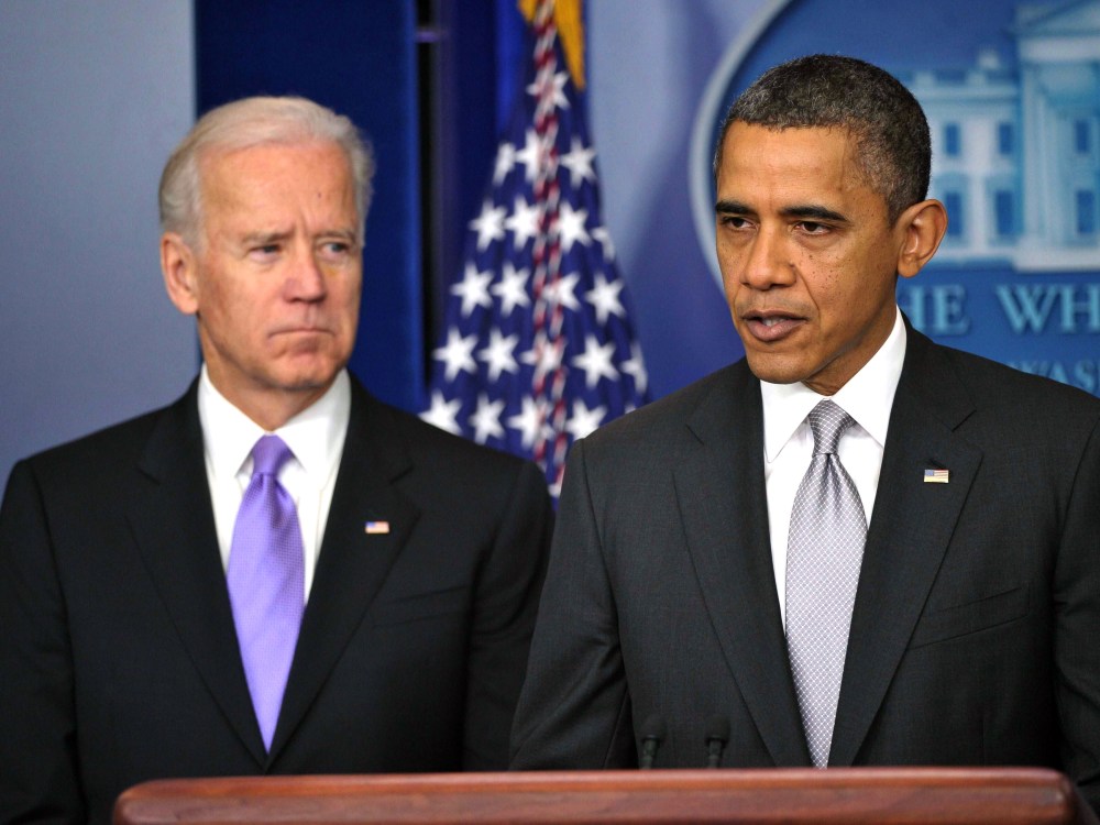 US President Barack Obama speaks as Vice President Joe Biden looks on as he delivers a statement in the Brady Briefing Room of the White House on December 19, 2012 in Washington, DC. Obama will appoint Vice President Joe Biden to lead a panel tasked...