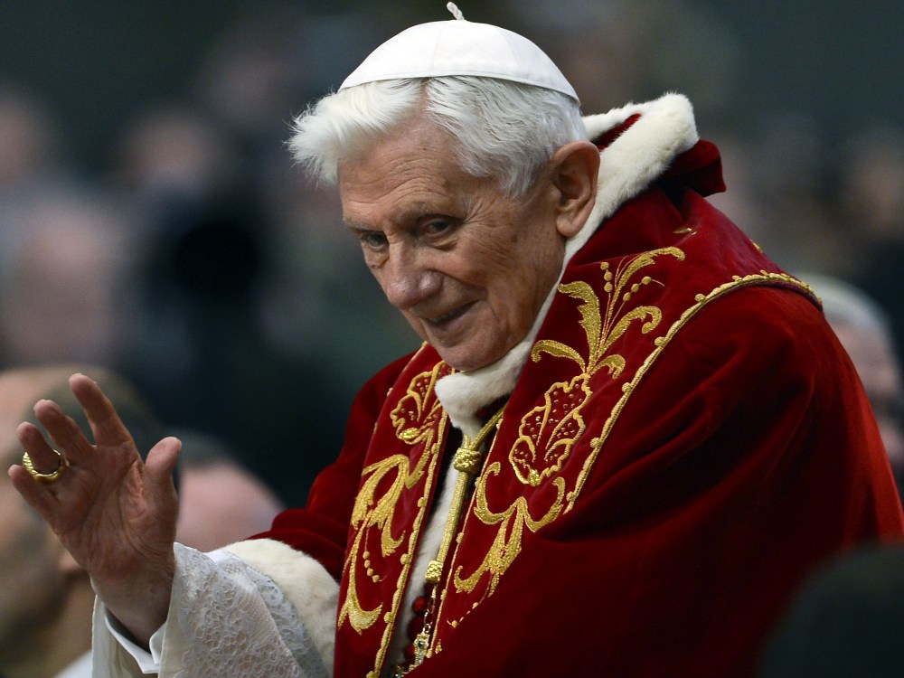 Pope Benedict XVI arrives to greet the faithful after the mass in St.Peter's Basilica to mark the 900th anniversary of the Order of the Knights of Malta, on February 9, 2013 at the Vatican. (Photo by Andreas Solaro/AFP/Getty Images)