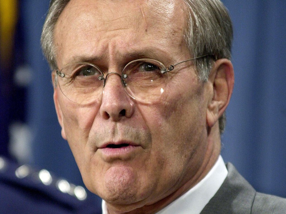 File Photo: US Secretary of Defense Donald Rumsfeld briefs the press at the Pentagon in 2001. (Photo by Shawn Thew/AFP/Getty Images, File)