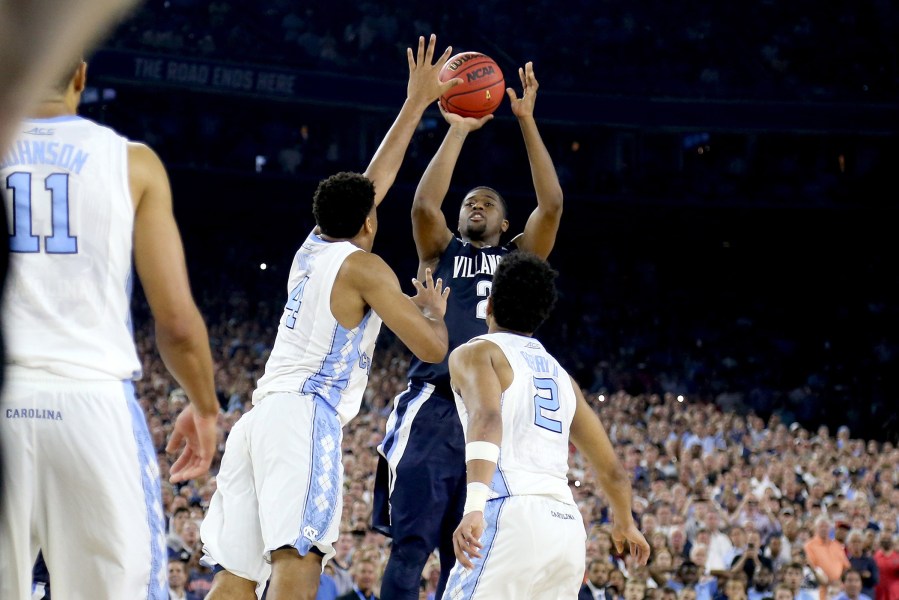 Kris Jenkins #2 of the Villanova Wildcats shoots the game-winning three pointer to defeat the North Carolina Tar Heels 77-74 in the 2016 NCAA Men's Final Four National Championship game on April 4, 2016 in Houston, Texas. (Photo by Streeter Lecka/Getty)