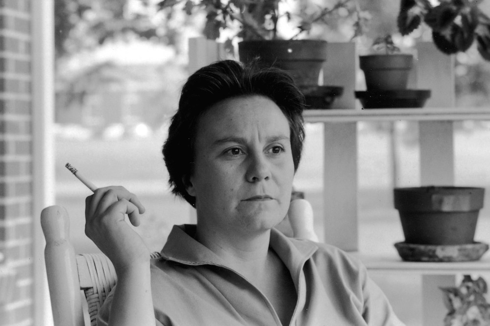 Portrait of American novelist Harper Lee smokes a cigarette as she sits on the porch of her parents home, Monroeville, Alabama, May 1961. (Photo by Donald Uhrbrock/The LIFE Images Collection/Getty)