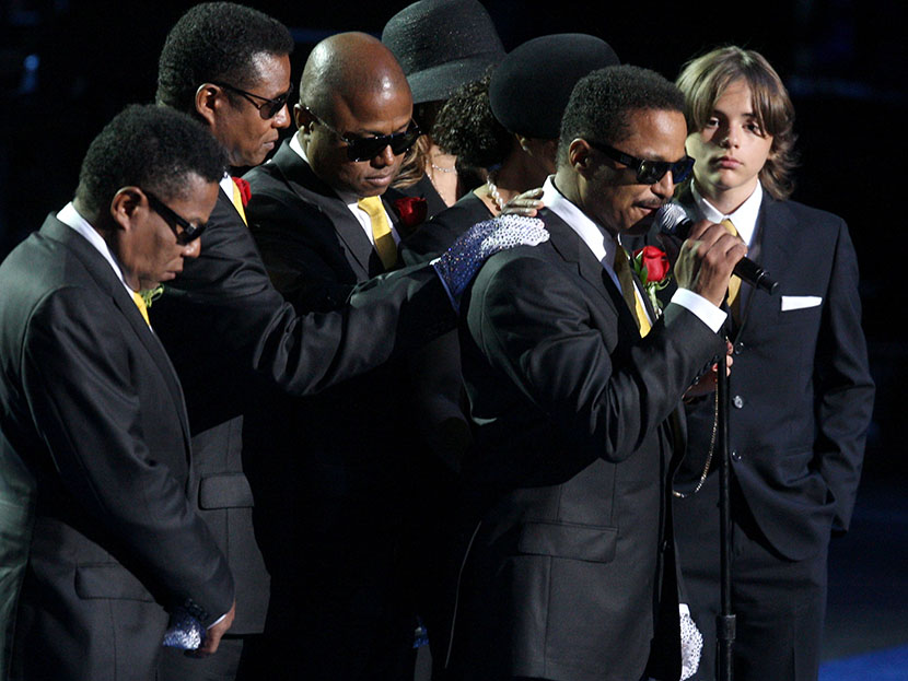 (L-R) Tito Jackson, Jermaine Jackson, Randy Jackson, La Toya Jackson, Janet Jackson and Michael Jackson's son Prince Michael Jackson look on as Marlon Jackson (2nd R) speaks during the Michael Jackson public memorial service held at Staples Center on...