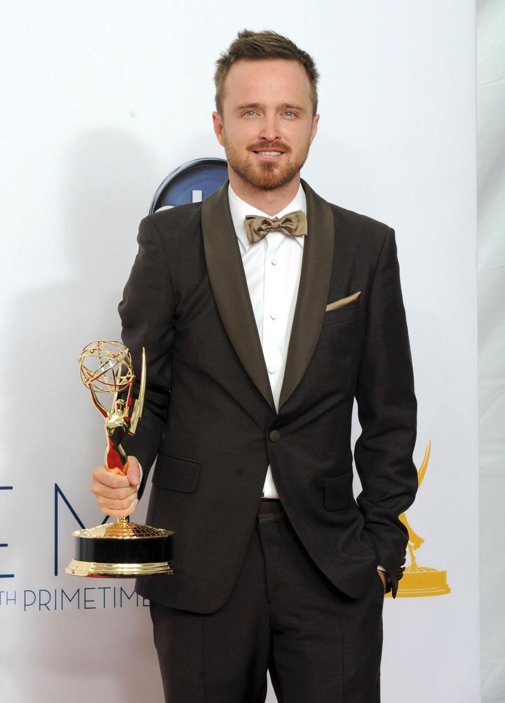 Actor Aaron Paul, winner of the award for Outstanding Supporting Actor In A Drama Series for "Breaking Bad," poses backstage at the 64th Primetime Emmy Awards at the Nokia Theatre on Sunday, Sept. 23, 2012, in Los Angeles.
