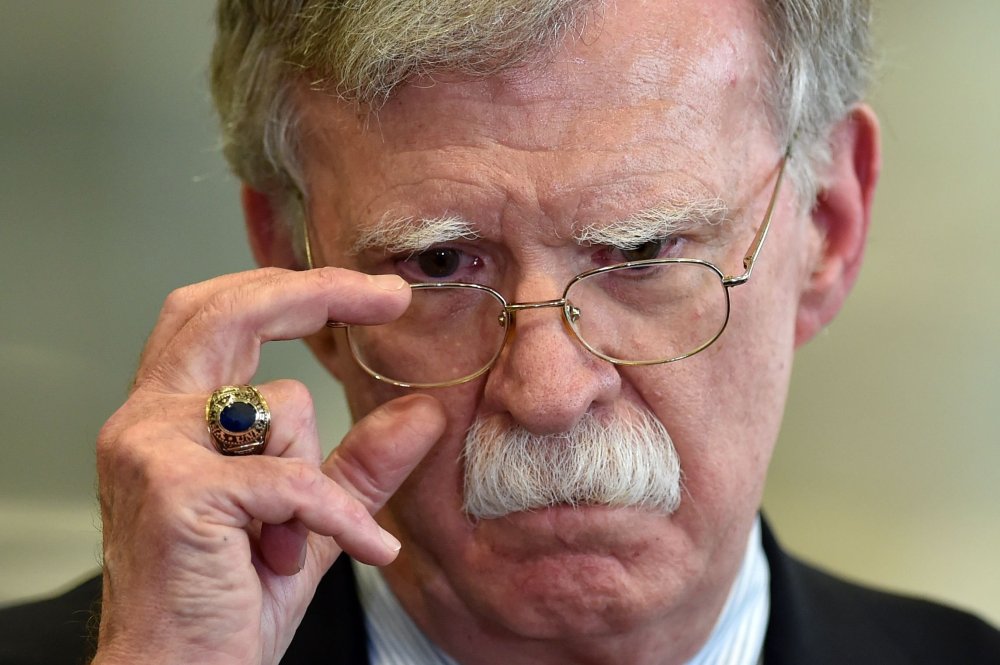 In this file photo taken on August 29, 2019 US National Security Advisor John Bolton answers journalists questions after his meeting with Belarus President in Minsk.