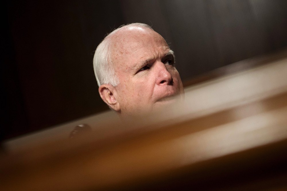 Committee chairman Senator John McCain (R-AZ) listens during a hearing of the Senate Armed Services Committee, March 8, 2016 in Washington, DC. (Photo by Brendan Smialowski/AFP/Getty)