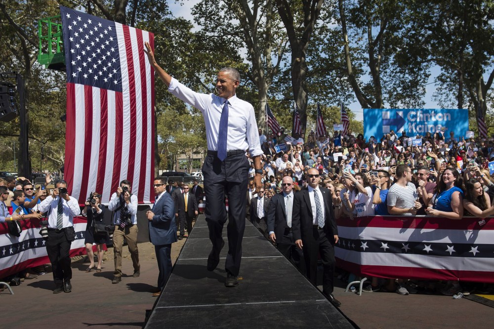 President Barack Obama arrives for a rally for Democratic presidential nominee Hillary Clinton at Eakins Oval in Philadelphia, Penn. on Sept. 13, 2016. (Photo by Saul Loeb/AFP/Getty)