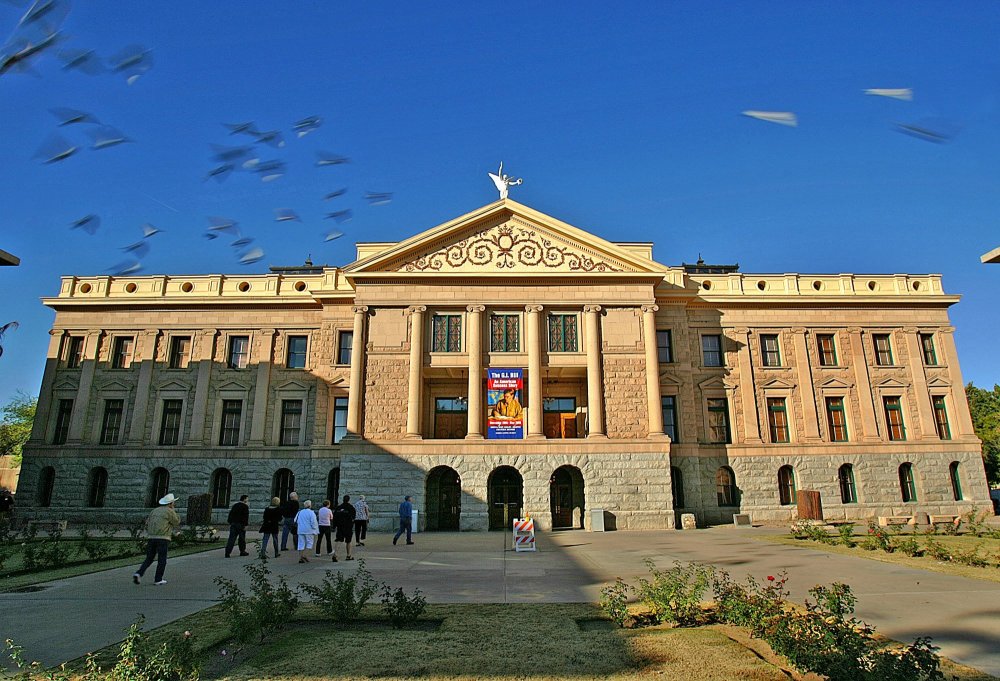 Citizens tour the Arizona Capitol grounds in Phoenix in this Dec. 14, 2004 file photo.