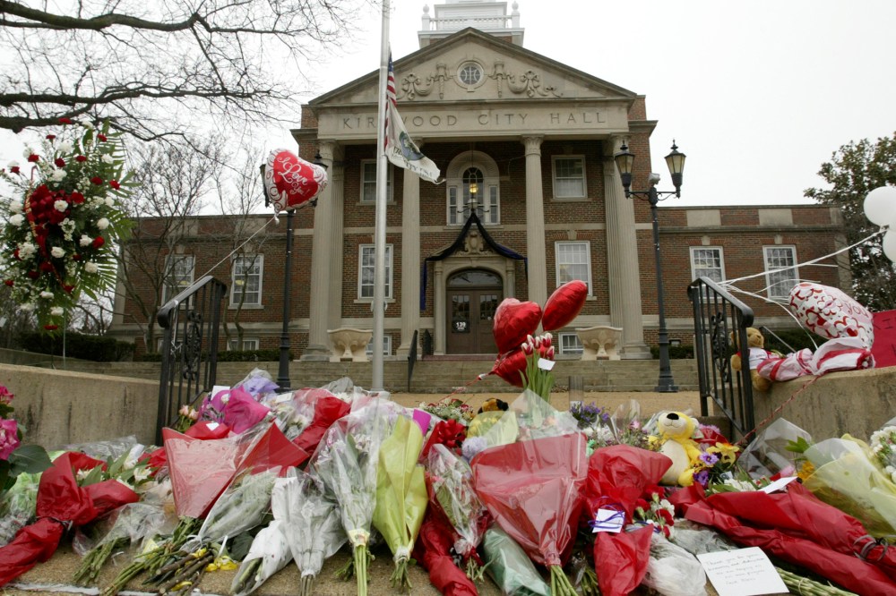 In this Feb. 8, 2008 file photo, a memorial for those killed in a shooting rampage is seen outside City Hall where a gunman opened fired the day before in Kirkwood, Mo.